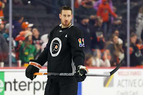 Kevin Hayes during warmups wearing the Pride Night jersey. (Photo by Tim Nwachukwu/Getty Images)