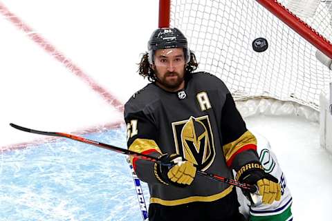 Mark Stone #61 of the Vegas Golden Knights eyes a loose puck against the Vancouver Canucks during the first period in Game Seven of the Western Conference Second Round. (Photo by Bruce Bennett/Getty Images)