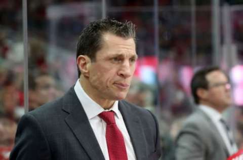 RALEIGH, NC – FEBRUARY 16: Rod Brind’ Amour head coach of the Carolina Hurricanes watches action on the ice from the bench during an NHL game against the Dallas Stars on February 16, 2019 at PNC Arena in Raleigh, North Carolina. (Photo by Gregg Forwerck/NHLI via Getty Images)