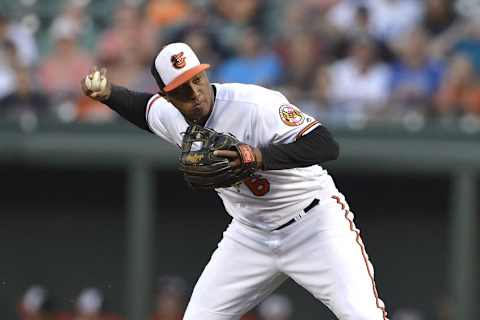 Aug 17, 2016; Baltimore, MD, USA; Baltimore Orioles second baseman Jonathan Schoop (6) throws to first base for the force out of Boston Red Sox right fielder Mookie Betts (not pictured) during the second inning at Oriole Park at Camden Yards. Mandatory Credit: Tommy Gilligan-USA TODAY Sports