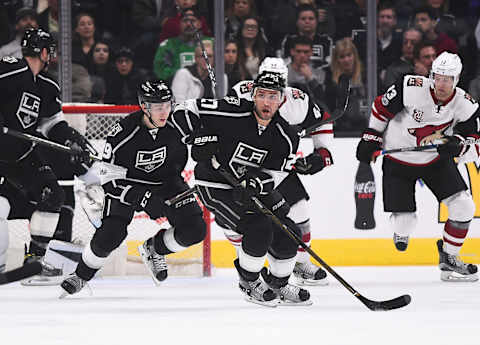 Feb 16, 2017; Los Angeles, CA, USA; Los Angeles Kings defenseman Alec Martinez (27) takes the puck down ice in the second period of the game against the Arizona Coyotes at Staples Center. Mandatory Credit: Jayne Kamin-Oncea-USA TODAY Sports