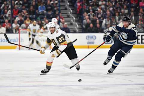 COLUMBUS, OH – NOVEMBER 5: Max Pacioretty #68 of the Vegas Golden Knights and Vladislav Gavrikov #44 of the Columbus Blue Jackets skate after a loose puck during the second period of a game on November 5, 2019 at Nationwide Arena in Columbus, Ohio. (Photo by Jamie Sabau/NHLI via Getty Images)