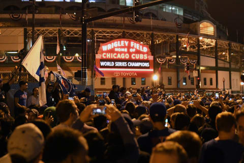 Nov 2, 2016; Chicago, IL, USA; Chicago Cubs fans celebrate after game seven of the 2016 World Series against the Cleveland Indians outside of Wrigley Field. Cubs won 8-7. Mandatory Credit: Patrick Gorski-USA TODAY Sports