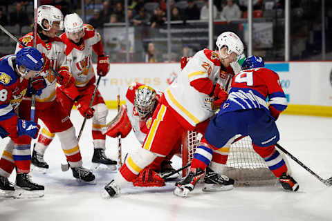 MONCTON, NB – APRIL 01: Maxim Barbashev#49 of Moncton Wildcats shoots the puck against Olivier Ciarlo#40 for Baie-Comeau Drakkar during the first overtime period at Avenir Centre on April 1, 2023, in Moncton, Canada. (Photo by Dale Preston/Getty Images)