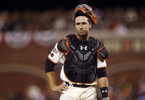 Oct 11, 2016; San Francisco, CA, USA; San Francisco Giants catcher Buster Posey (28) reacts during the ninth inning of game four of the 2016 NLDS playoff baseball game against the Chicago Cubs at AT&T Park. Mandatory Credit: John Hefti-USA TODAY Sports