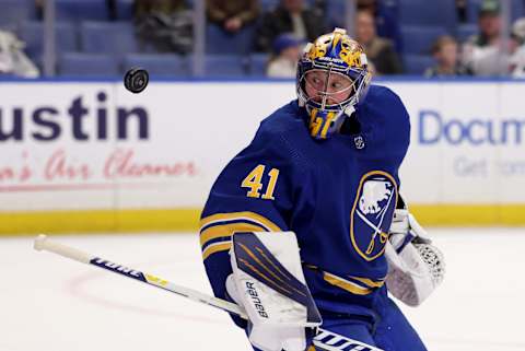 Mar 4, 2022; Buffalo, New York, USA; Buffalo Sabres goaltender Craig Anderson (41) makes a save and looks for the puck during the first period against the Minnesota Wild at KeyBank Center. Mandatory Credit: Timothy T. Ludwig-USA TODAY Sports