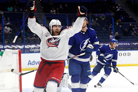 Mar 30, 2021; Tampa, Florida, USA; Columbus Blue Jackets defenseman David Savard (58) celebrates after scoring a goal against the Tampa Bay Lightning during the second period at Amalie Arena. Mandatory Credit: Kim Klement-USA TODAY Sports