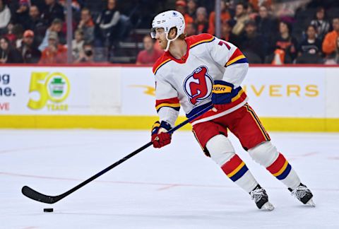 Dec 3, 2022; Philadelphia, Pennsylvania, USA; New Jersey Devils defenseman Dougie Hamilton (7) controls the puck against the Philadelphia Flyers in the first period at Wells Fargo Center. Mandatory Credit: Kyle Ross-USA TODAY Sports