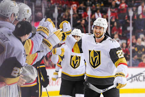 CALGARY, AB – MARCH 8: Shea Theodore #27 of the Vegas Golden Knights celebrates with the bench after scoring the game-winning goal against the Calgary Flames during an NHL game at Scotiabank Saddledome on March 8, 2020 in Calgary, Alberta, Canada. (Photo by Derek Leung/Getty Images)