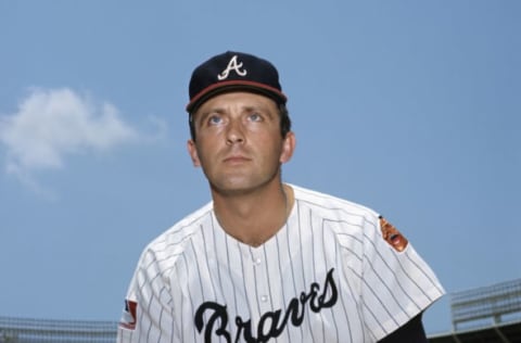 ATLANTA – 1969: Pitcher Phil Niekro of the Atlanta Braves, poses for a portrait prior to a game in 1969 at Atlanta-Fulton County Stadium in Atlanta, Georgia. (Photo by: Diamond Images/Getty Images)