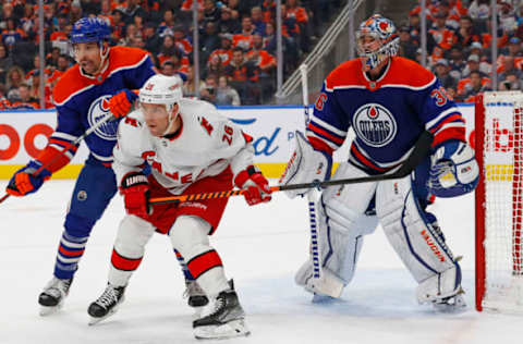 Oct 20, 2022; Edmonton, Alberta, CAN; Carolina Hurricanes forward Paul Stastny (26) battles with Edmonton Oilers defensemen Cody Ceci (5) in front of goaltender Jack Campbell (36) Mandatory Credit: Perry Nelson-USA TODAY Sports