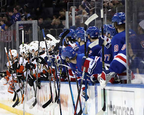 NEW YORK, NEW YORK – DECEMBER 22: The New York Rangers and the Anaheim Ducks salute Micheal Haley #38 and Nicolas Deslauriers #20 (Photo by Bruce Bennett/Getty Images)