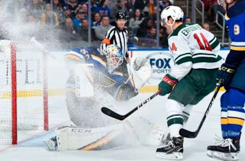 ST. LOUIS, MO – OCTOBER 30: Jordan Binnington #50 of the St. Louis Blues defends the net against Joel Eriksson Ek #14 of the Minnesota Wild at Enterprise Center on October 30, 2019, in St. Louis, Missouri. (Photo by Joe Puetz/NHLI via Getty Images)