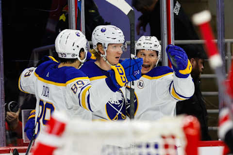 RALEIGH, NC – NOVEMBER 07: Zemgus Girgensons #28 of the Buffalo Sabres scores a goal and celebrates with Jeff Skinner #53 and Alex Tuch #89 during the third period the game against the Carolina Hurricanes at PNC Arena on November 07, 2023 in Raleigh, North Carolina. Hurricanes defeat Sabres 3-2. (Photo by Jaylynn Nash/Getty Images)