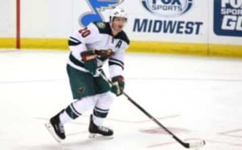 Oct 13, 2016; St. Louis, MO, USA; Minnesota Wild defenseman Ryan Suter (20) skates with the puck during the third period against the St. Louis Blues at Scottrade Center. The Blues won the game 3-2. Mandatory Credit: Billy Hurst-USA TODAY Sports