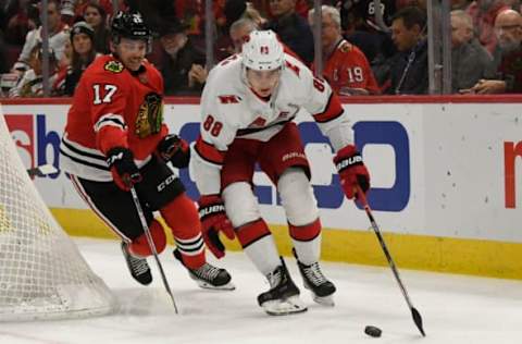 Nov 19, 2019; Chicago, IL, USA; Chicago Blackhawks center Dylan Strome (17) defends Carolina Hurricanes center Martin Necas (88) during the first period at United Center. Mandatory Credit: David Banks-USA TODAY Sports