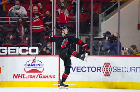 Mar 27, 2021; Raleigh, North Carolina, USA; Carolina Hurricanes center Martin Necas (88) celebrates his second period goal against the Tampa Bay Lightning at PNC Arena. Mandatory Credit: James Guillory-USA TODAY Sports