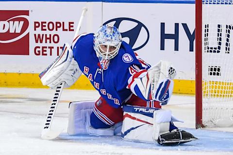 Nov 14, 2021; New York, New York, USA; New York Rangers goaltender Alexandar Georgiev (40) makes a glove save against the New Jersey Devils during the second period at Madison Square Garden. Mandatory Credit: Dennis Schneidler-USA TODAY Sports