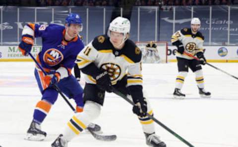 UNIONDALE, NEW YORK – JANUARY 18: Trent Frederic #11 of the Boston Bruins skates against the New York Islanders at the Nassau Coliseum on January 18, 2021 in Uniondale, New York. The Islanders shut-out the Bruins 1-0. (Photo by Bruce Bennett/Getty Images)