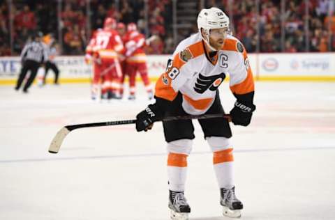 NHL Power Rankings: Philadelphia Flyers center Claude Giroux (28) reacts to an empty net goal from Calgary Flames defenseman Mark Giordano (not pictured) during the third period at Scotiabank Saddledome. The Flames won 3-1. Mandatory Credit: Candice Ward-USA TODAY Sports