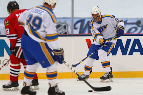 ST. LOUIS, MO – DECEMBER 31: Jeff Brown #21 of the St. Louis Blues passes the puck against the Chicago Blackhawks during the 2017 NHL Winter Classic Alumni Game at Busch Stadium on December 31, 2016 in St. Louis, Missouri. (Photo by Dilip Vishwanat/Getty Images)