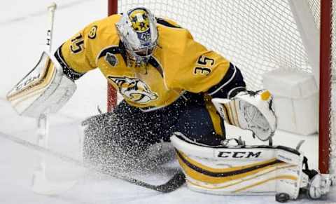 Nashville Predators goalie Pekka Rinne (35) makes a key save. Mandatory Credit: George Walker IV/The Tennessean via USA TODAY NETWORK