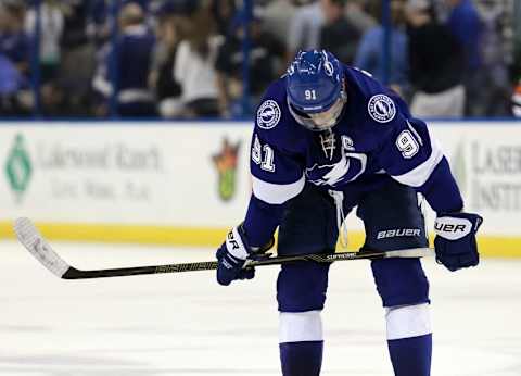 Dec 22, 2015; Tampa, FL, USA; Tampa Bay Lightning center Steven Stamkos (91) looks down as they lose to the Vancouver Canucks at Amalie Arena. Vancouver Canucks defeated the Tampa Bay Lightning 2-1. Mandatory Credit: Kim Klement-USA TODAY Sports