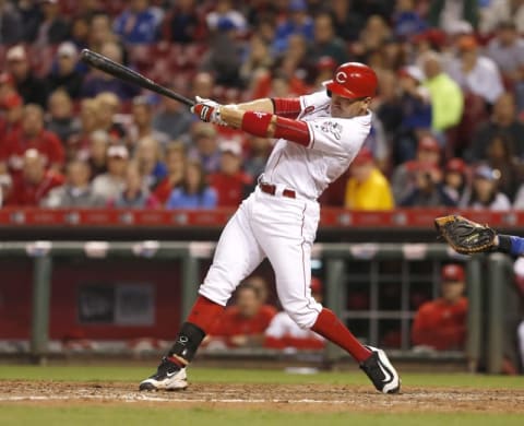 Sep 30, 2016; Cincinnati, OH, USA; Cincinnati Reds first baseman Joey Votto hits a two-run home run against the Chicago Cubs during the ninth inning at Great American Ball Park. The Cubs won 7-3. Mandatory Credit: David Kohl-USA TODAY Sports