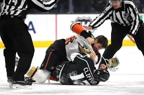 LOS ANGELES, CA: Anaheim Ducks Left Wing Nick Ritchie (37) fights with Los Angeles Kings Left Wing Kyle Clifford (13) and shoves him to the ice during an NHL game on January 13, 2018. (Photo by Chris Williams/Icon Sportswire via Getty Images)