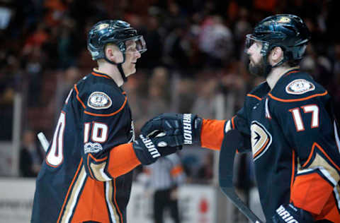 Apr 6, 2017; Anaheim, CA, USA; Anaheim Ducks right wing Corey Perry (10) and center Ryan Kesler (17) celebrate the 4-0 victory against the Chicago Blackhawks following the third period at Honda Center. Mandatory Credit: Gary A. Vasquez-USA TODAY Sports