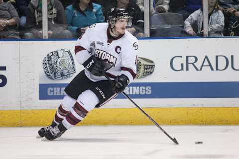 May 17, 2014. Matt Finn (4) of the Guelph Storm looks to make a pass during their 2014 Memorial Cup game played at Budweiser Gardens in London Ontario, Canada. The Guelph Storm defeated the Edmonton Oil Kings by a score of 5-2. (Photo by Mark Spowart/Icon SMI/Corbis via Getty Images)