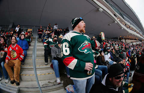 MINNEAPOLIS, MN – FEBRUARY 21: A Minnesota Wild fan yells while attending the 2016 Coors Light Stadium Series game between the Chicago Blackhawks and the Minnesota Wild at TCF Bank Stadium on February 21, 2016 in Minneapolis, Minnesota. (Photo by Eliot J. Schechter/NHLI via Getty Images)