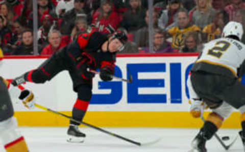 Mar 11, 2023; Raleigh, North Carolina, USA; Carolina Hurricanes right wing Andrei Svechnikov (37) takes a shot against the Vegas Golden Knights during the third period at PNC Arena. Mandatory Credit: James Guillory-USA TODAY Sports