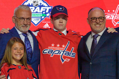 VANCOUVER, BC – JUNE 21: Connor McMichael poses for a photo onstage after being selected twenty-five overall by the Washington Capitals during the first round of the 2019 NHL Draft at Rogers Arena on June 21, 2019 in Vancouver, British Columbia, Canada. (Photo by Derek Cain/Icon Sportswire via Getty Images)