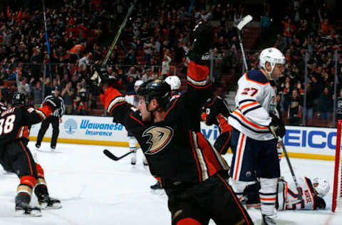 ANAHEIM, CA: Cam Fowler #4 and Derek Grant #38 of the Anaheim Ducks celebrate a goal in the third period against the Edmonton Oilers on February 25, 2018. (Photo by Debora Robinson/NHLI via Getty Images)