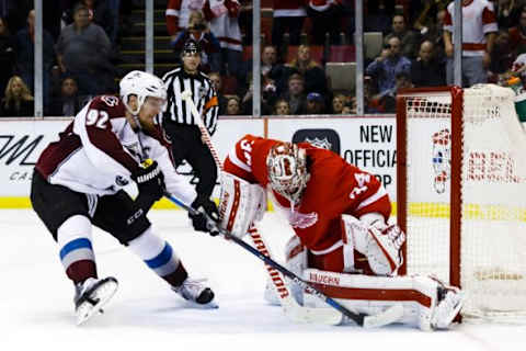 Feb 12, 2016; Detroit, MI, USA; Detroit Red Wings goalie Petr Mrazek (34) makes the save on a shootout attempt by Colorado Avalanche left wing Gabriel Landeskog (92) at Joe Louis Arena. Colorado won 3-2 in an overtime shootout. Mandatory Credit: Rick Osentoski-USA TODAY Sports