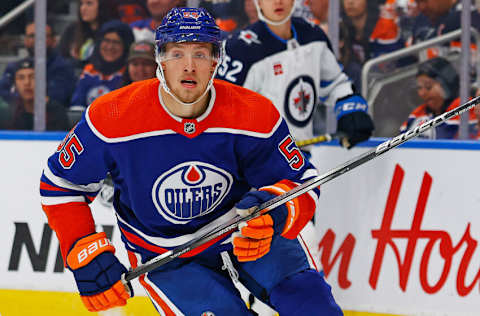 Sep 24, 2023; Edmonton, Alberta, CAN; Edmonton Oilers forward Dylan Holloway (55) follows the play against the Winnipeg Jets at Rogers Place. Mandatory Credit: Perry Nelson-USA TODAY Sports