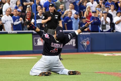 Oct 19, 2016; Toronto, Ontario, CAN; Cleveland Indians first baseman Carlos Santana (41) reacts after making the final catch to beat the Toronto Blue Jays in game five of the 2016 ALCS playoff baseball series at Rogers Centre. Mandatory Credit: Nick Turchiaro-USA TODAY Sports