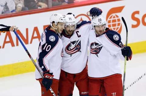 NHL Power Rankings: Columbus Blue Jackets center Alexander Wennberg (10)celebrates his goal with teammates after he scores against the Winnipeg Jets at MTS Centre. Mandatory Credit: Bruce Fedyck-USA TODAY Sports