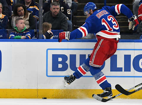 ST. LOUIS, MO – MARCH 17: New York Rangers center Kevin Hayes (13) kicks the puck after losing his stick during a NHL game between the New York Rangers and the St. Louis Blues on March 17, 2018, at Scottrade Center, St. Louis, MO. St. Louis beat New York in overtime, 4-3. (Photo by Keith Gillett/Icon Sportswire via Getty Images).