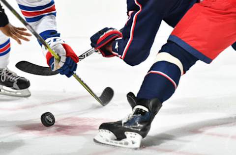 COLUMBUS, OH – OCTOBER 13: Players face-off during the second period of a game between the Columbus Blue Jackets and the New York Rangers on October 13, 2017 at Nationwide Arena in Columbus, Ohio. (Photo by Jamie Sabau/NHLI via Getty Images)