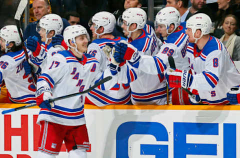 NASHVILLE, TENNESSEE – DECEMBER 29: Jesper Fast #17 of the New York Rangers is congratulated by teammates after scoring the go ahead goal against the Nashville Predators during the third period at Bridgestone Arena on December 29, 2018 in Nashville, Tennessee. (Photo by Frederick Breedon/Getty Images)