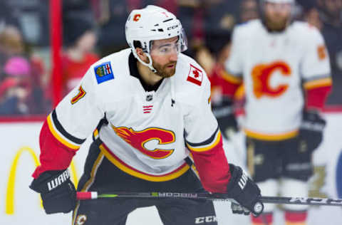 OTTAWA, ON – MARCH 09: Calgary Flames Defenceman T.J. Brodie (7) warm-up before National Hockey League action between the Calgary Flames and Ottawa Senators on March 9, 2018, at Canadian Tire Centre in Ottawa, ON, Canada. (Photo by Richard A. Whittaker/Icon Sportswire via Getty Images)