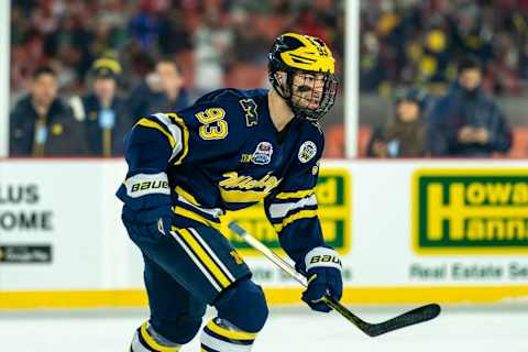 CLEVELAND, OH FEBRUARY 18: Eric Ciccolini #93 of the Michigan Wolverines skates toward the bench after scoring his 3rd-period goal against the Ohio State Buckeyes during the Faceoff on the Lake NCAA ice hockey game at FirstEnergy Stadium on February 18, 2023, in Cleveland, OH. Ohio State won the game with a final score of 4-2. (Photo by Jaime Crawford/Getty Images)