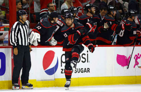 RALEIGH, NORTH CAROLINA – MAY 14: Max Domi #13 of the Carolina Hurricanes celebrates a second period goal in Game Seven of the First Round of the 2022 Stanley Cup Playoffs against the Boston Bruins at PNC Arena on May 14, 2022 in Raleigh, North Carolina. (Photo by Jared C. Tilton/Getty Images)