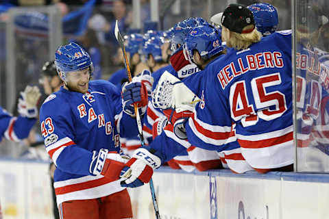 Mar 13, 2017; New York, NY, USA; New York Rangers defenseman Steven Kampfer (43) celebrates his goal against the Tampa Bay Lightning with teammates during the first period at Madison Square Garden. Mandatory Credit: Brad Penner-USA TODAY Sports