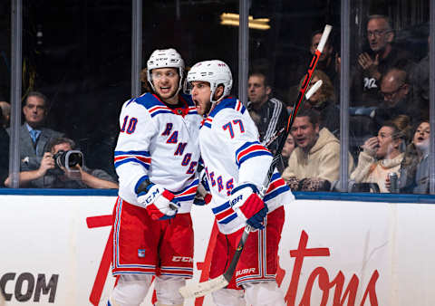 TORONTO, ON – DECEMBER 28: Tony DeAngelo #77 of the New York Rangers celebrates after scoring the game winning goal in overtime against the Toronto Maple Leafs with teammate Artemi Panarin #10 at the Scotiabank Arena on December 28, 2019 in Toronto, Ontario, Canada. (Photo by Kevin Sousa/NHLI via Getty Images)