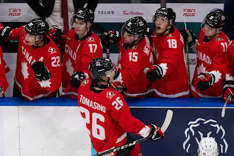 Philip Tomasino #26 of Canada celebrates his goal against Switzerland  (Photo by Codie McLachlan/Getty Images)