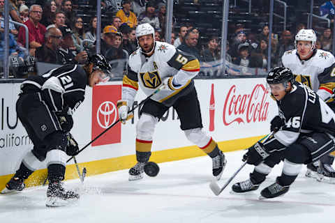 LOS ANGELES, CA – SEPTEMBER 19: Mario Kempe #21 and Blake Lizotte #46 of the Los Angeles Kings and Deryk Engelland #5 and Jimmy Schuldt #4 of the Vegas Golden Knights watch the puck during the first period of the preseason game at STAPLES Center on September 19, 2019 in Los Angeles, California. (Photo by Juan Ocampo/NHLI via Getty Images)