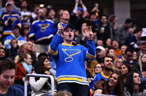 Mar 21, 2017; Denver, CO, USA; St. Louis Blues fans celebrates a goal by left wing Magnus Paajarvi (56) (not pictured) in the third period against the Colorado Avalanche at the Pepsi Center. The Blues defeated the Avalanche 4-2. Mandatory Credit: Ron Chenoy-USA TODAY Sports